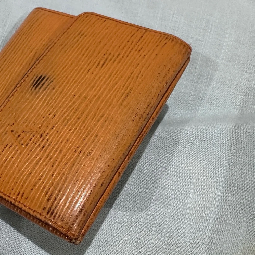 AUTHENTIC Louis Vuitton wallet. Tassel yellow.